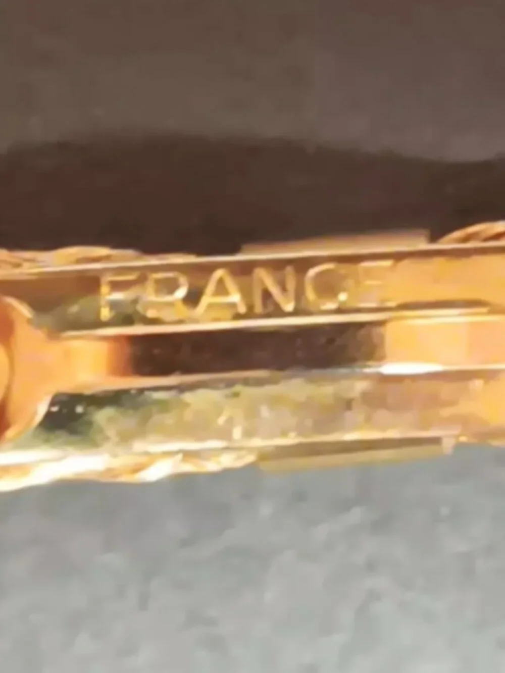 1970'S Vintage France (stamped) hair barrette, gold tone woven metal slim bow.